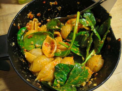 RomescoPastaSpinach Whole wheat shells with baby spinach and romesco sauce